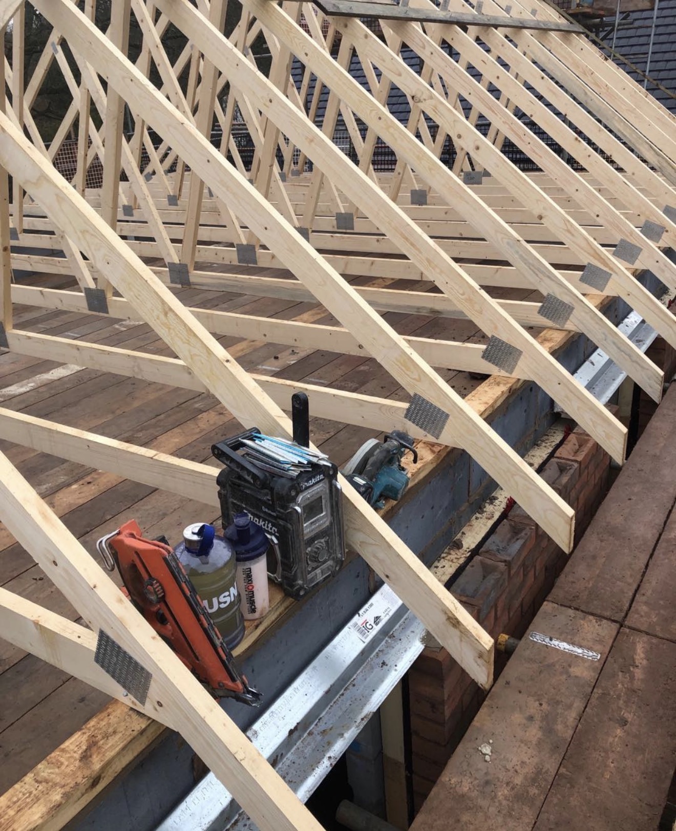 Roof timber trusses and frame construction