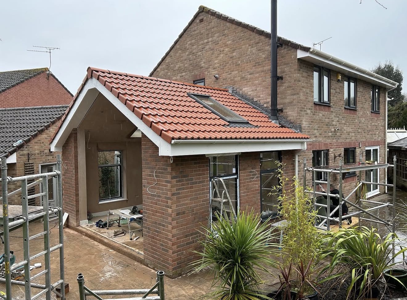Completed house extension with tiled roof