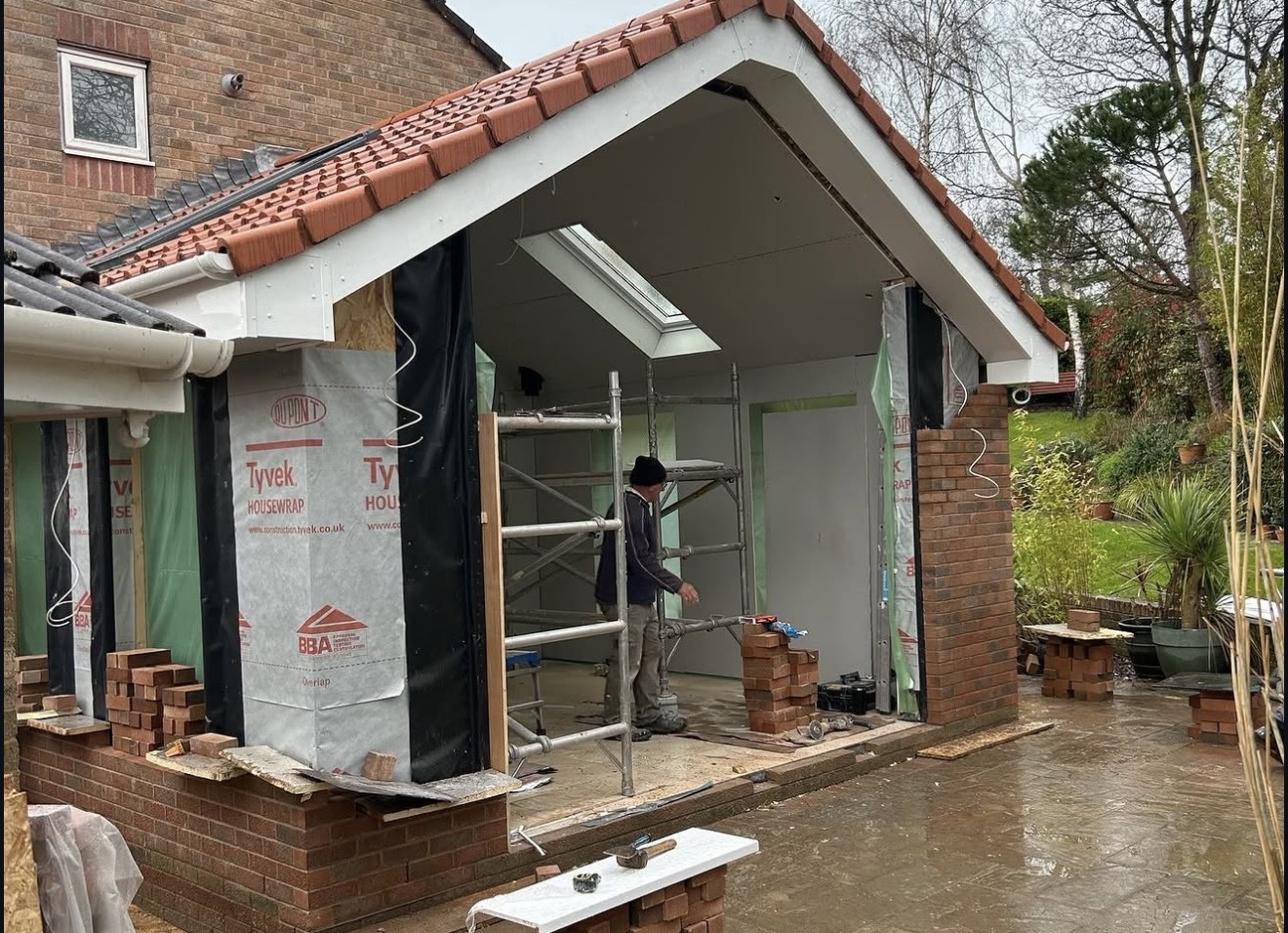 House extension in progress with scaffolding